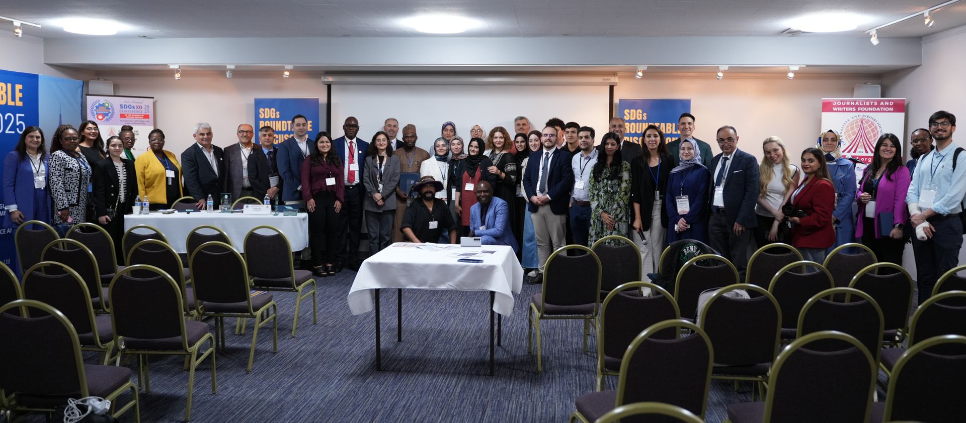 Receiving recognition plaque at the SDGs Roundtable Discussion